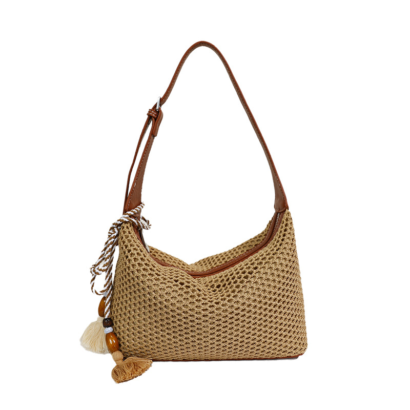 Nuevo verano retro hombro bajo la axila tela de paja bolsas de mujer trampolín oblicuo bolsas de tela de ocio diarias bolsas de playa de vacaciones