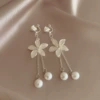 Ear clips with tassels, flowered