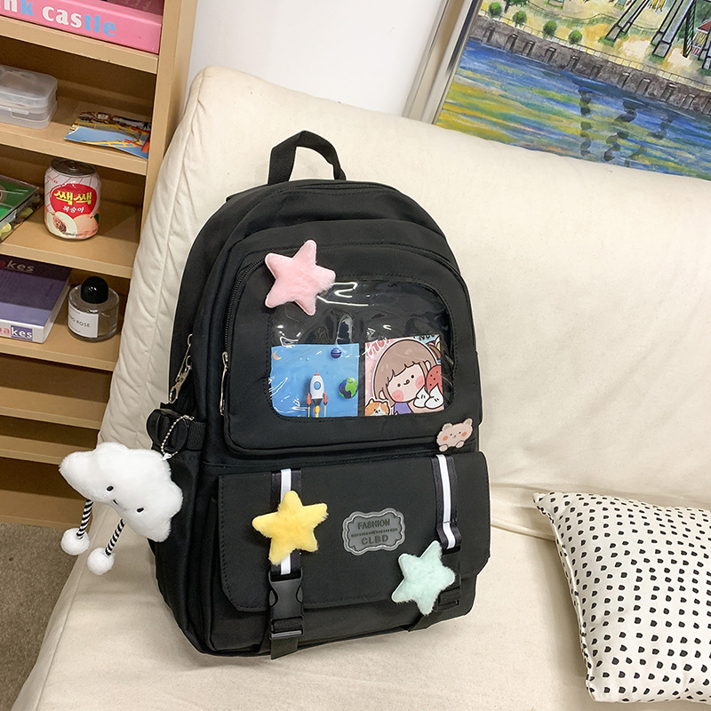 Mochilas escolares de moda bolsos de hombro para niñas estudiantes de primaria y secundaria sencillos paños transfronterizos ligeros bolsos de mano al por mayor bolsos de gran capacidad