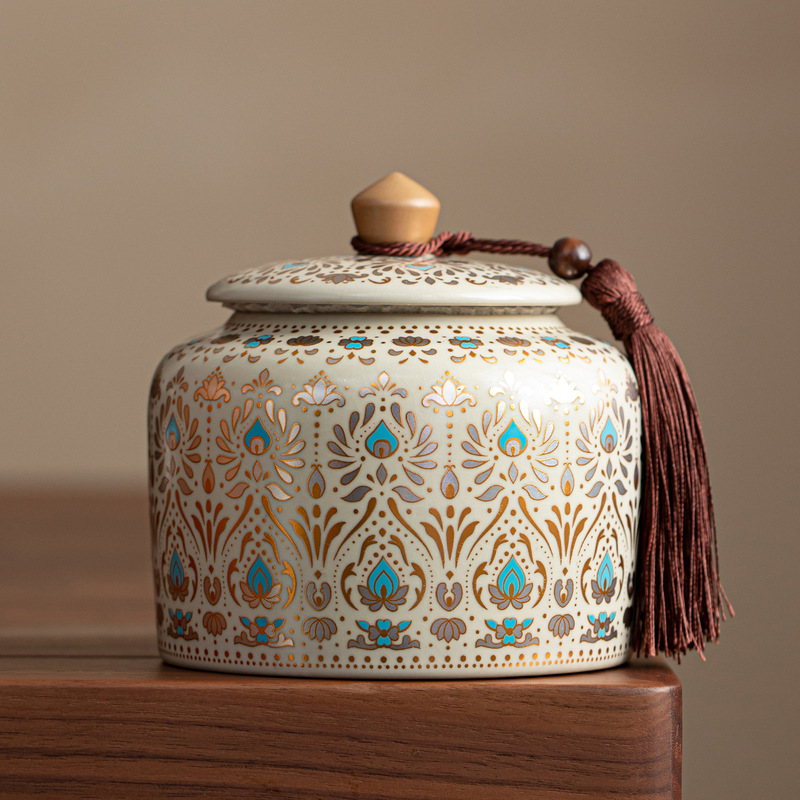 Chinese-Style Ru Kiln Dunhuang Tea Canister with Golden Floral Pattern and Tassel Decoration, Sealed Moisture-Proof Jar, Exquisite and High-End Storage Container Chinese-Style Ru Kiln Dunhuang Tea Canister with Golden Floral Pattern and Tassel Decoration, Sealed Moisture-Proof Jar, Exquisite and High-End Storage Container
