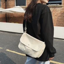 日系休闲帆布包斜挎包女港风简约单肩包学生背包上课通勤邮差包男