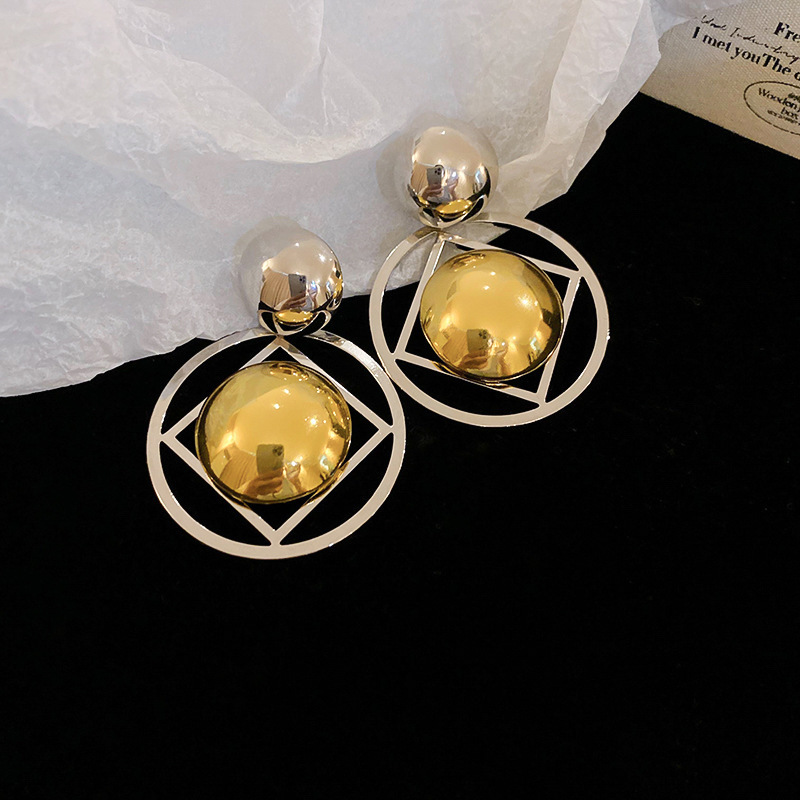 Aguja de plata MEDIADOS DE-antigua flor redonda borla pendientes de metal retro europeo y americano elegante luz pendientes de lujo al por mayor para las mujeres