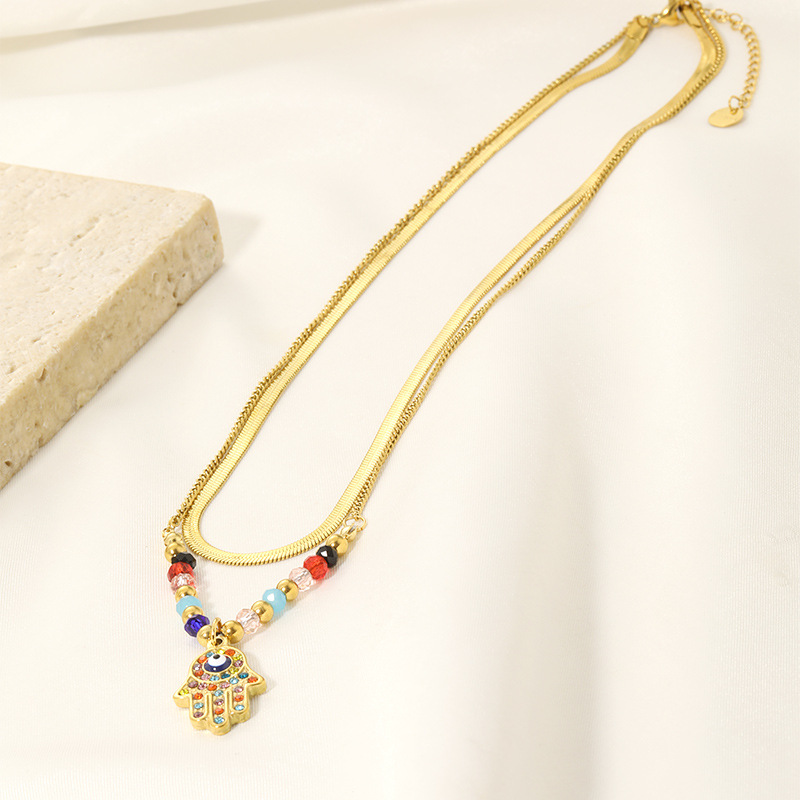 Europeo y americano nuevo estilo de aceite de goteo ojos de Palma de diamantes colgante collar de doble capa de la personalidad femenina todo-fósforo de acero inoxidable Collar chapado en oro image 4