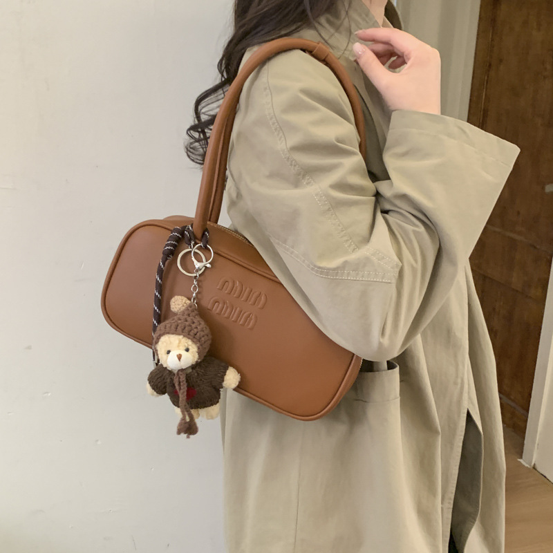 Retro texturas coreanas bolsas debajo de las axilas para mujeres 2025, invierno nuevo bolsas de almohada de estilo extranjero, bolsas de hombro de Boston.