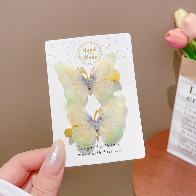 Clip de cabello de mariposa móvil ultra inmortal electrónica azul tulle perla clip de boca de pato decoración accesorios de playa clip tocado