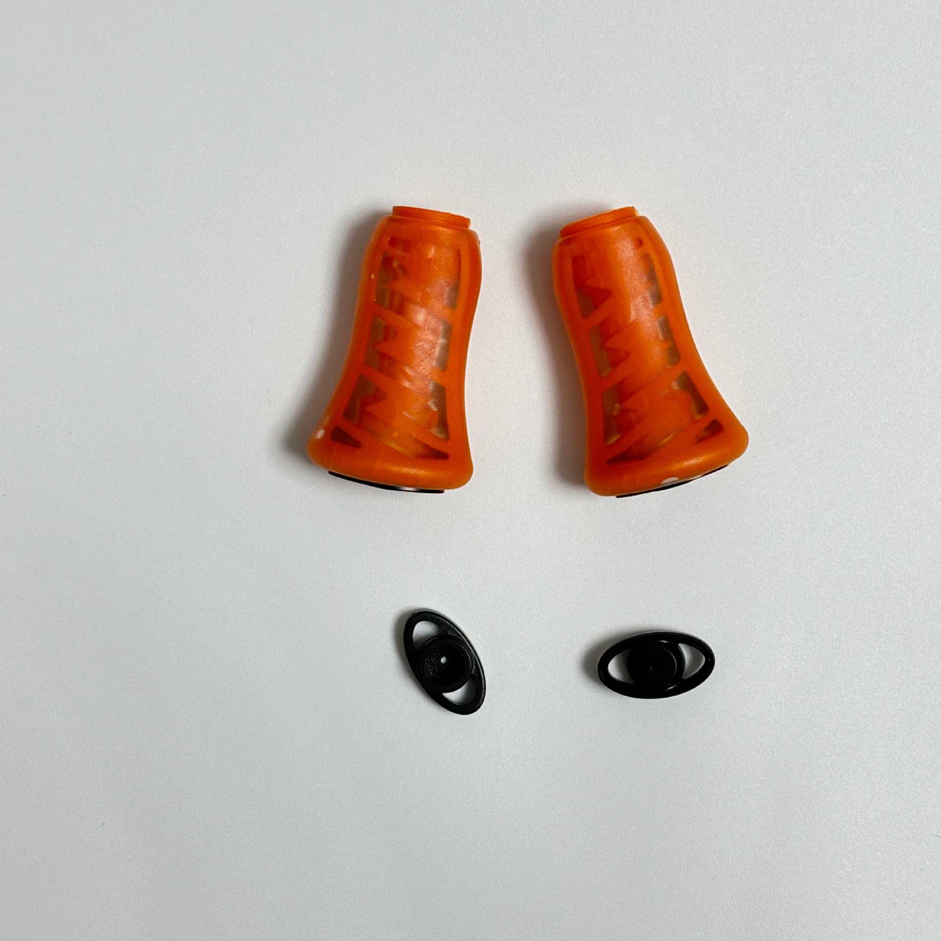 A pair of orange silicone grip balls
