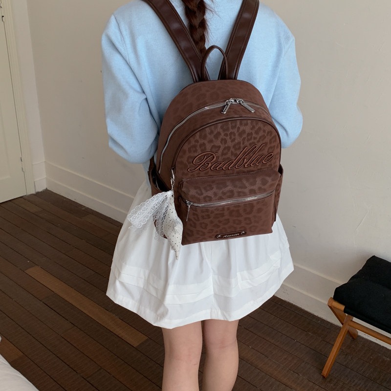 Estudiantes exquisitos nicho nuevo mochila 2026 popular mochila de hombro para viajar estampado de leopardo simple mujer gran capacidad de verano