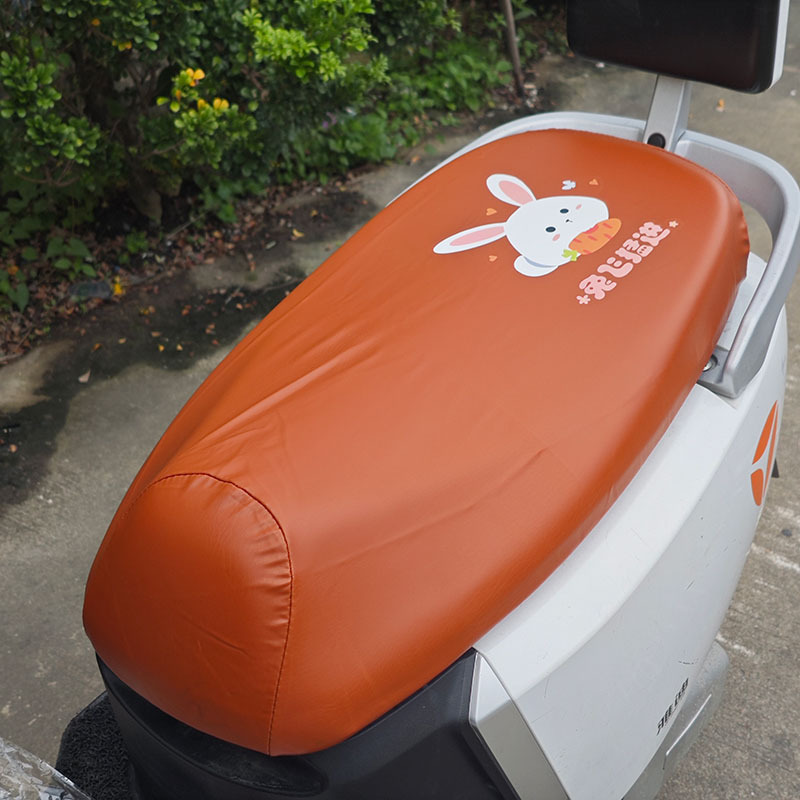Electric Motorcycle Brown Elastic Leather Cartoon Seat Cushion Sunscreen and Rainproof Yadi Emma Table Bell Thickened Leather Seat Cover