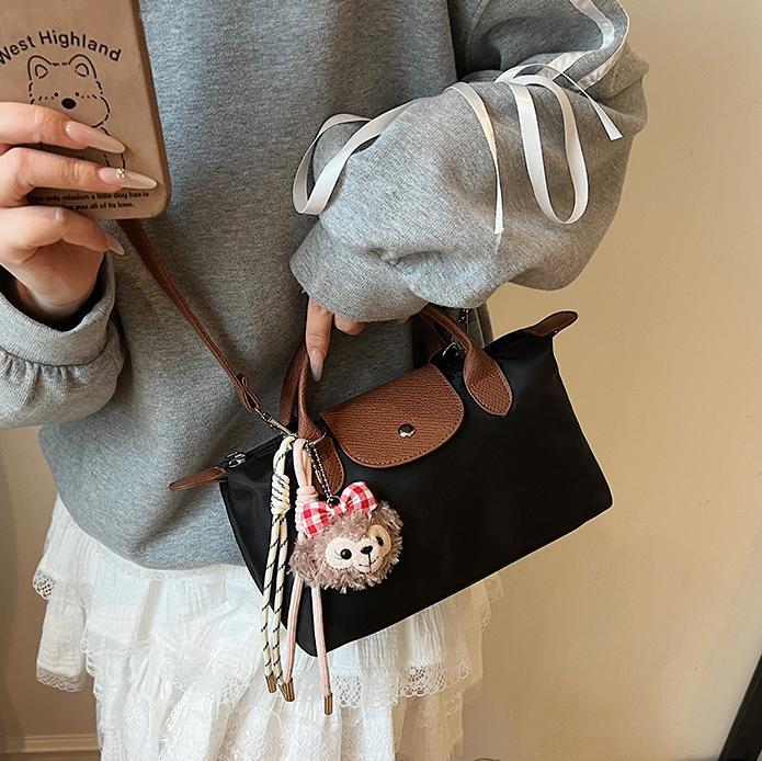 Bolsa de mano francesa de nicho Zhonglong para mujeres 2025 nuevo paquete de hombro casual universal para viajar bolso de alta calidad