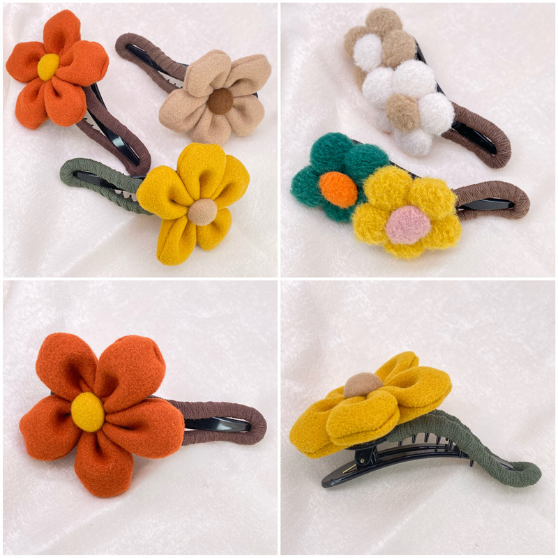 Otoño e Invierno Flor de felpa gran cuerno clip de pico de pato clip puntiagudo un yuan dos yuanes tienda supermercado joyería