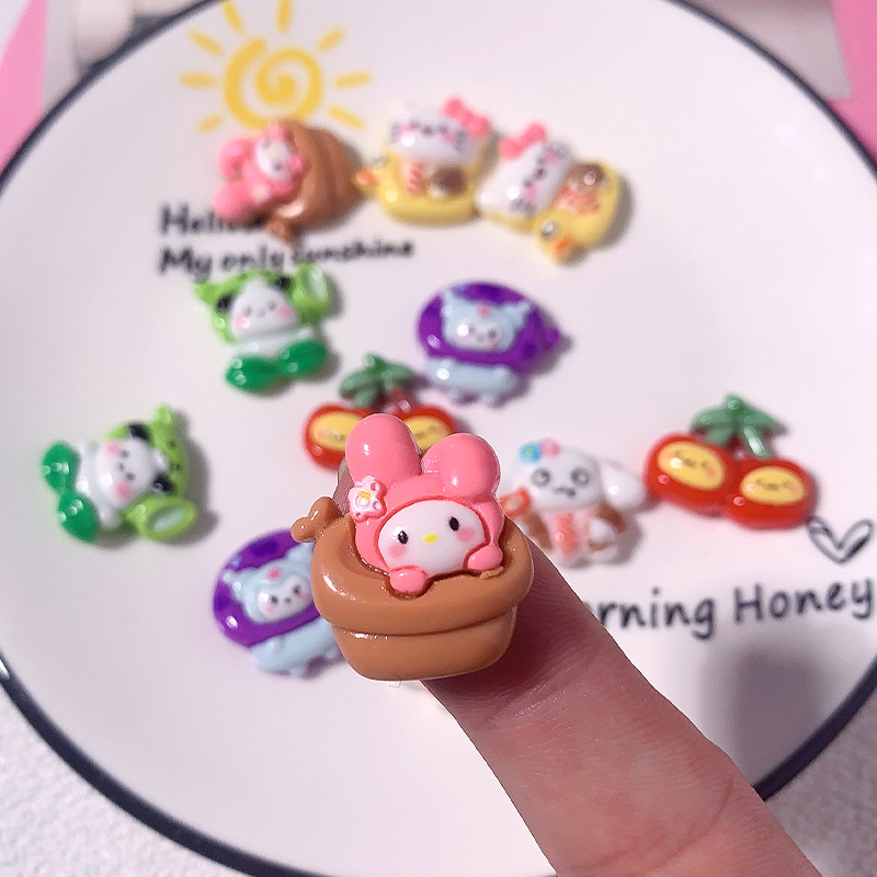 Nuevos dibujos animados Sanrio plantas DIY accesorios de resina crema pegamento para el cabello adornos de cabello hebilla de zapatos taza pegatinas accesorios hechos a mano