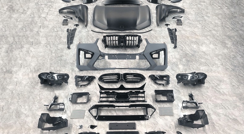 Suitable for BMW X6 E71, upgrade to G06 X6M body kit, including front and rear bumpers, hood, and headlights