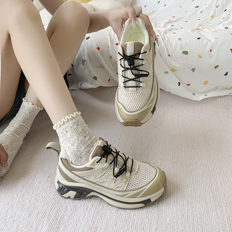 Fashionable trend universal running sneakers outside climbing…