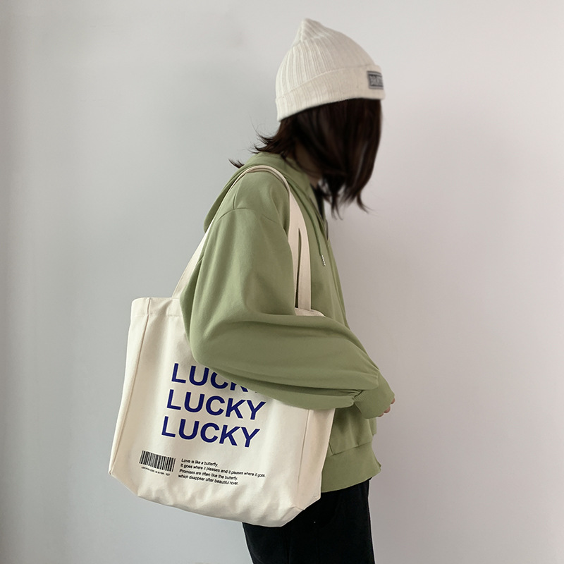 New letter ins lazy wind canvas bag women's single shoulder Japanese and Korean style simple large capacity student class handbag