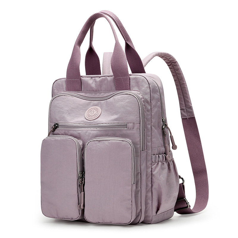 Mochila transfronteriza caliente de alta capacidad, mochila de estudiantes, tendencia a prueba de salpicaduras, bolso de tela Oxford, bolso de moda para mujeres