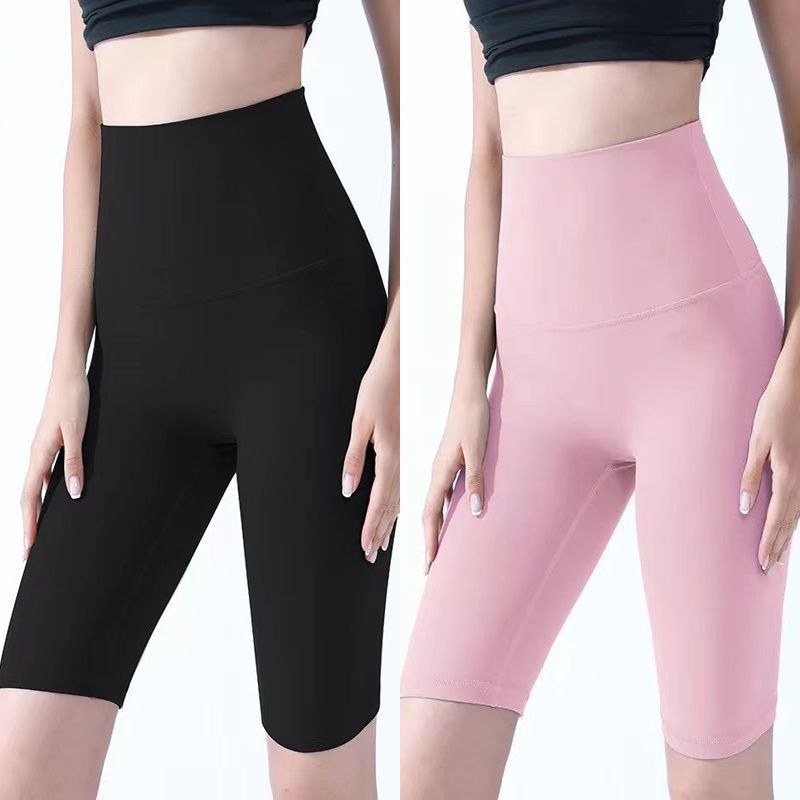 Pantalones cortos desnudos de mujer elásticos apretados para elevar las caderas de cinco puntos pantalones deportivos de secado rápido succión de sudor entrenamiento para correr fábrica de comercio de ping