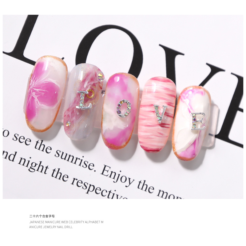 Nueva LZ manicura 26 letras aleación joyería estilo japonés Internet celebridad plata letras manicura joyería clavo Taladro