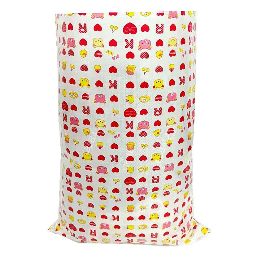 Bolsas tejidas impermeables laminadas al por mayor con diseño de corazón rojo, bolsas de piel de serpiente engrosadas, bolsas de mudanza con envío exprés, bolsas para empacar ropa, bolsas para paquetes de textiles del hogar.
