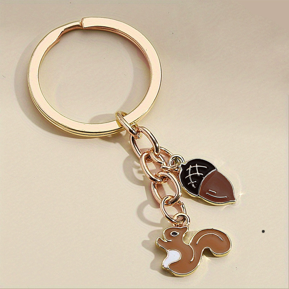 Ventas transfronterizas personales colgantes perlas abejas colgantes girasoles joyas de Navidad ardilla llaveros