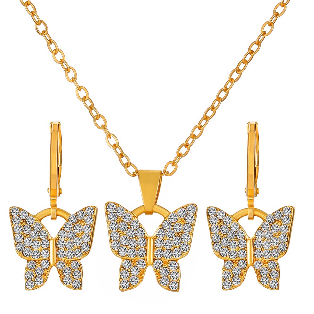 Transfronterizo europeo y americano Venta caliente joyería traje personalidad femenina diamante aleación corona mariposa collar pendientes traje ins moda