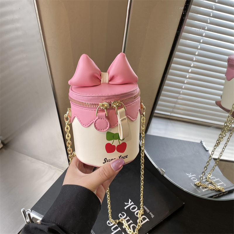 Bolso de cubo lindo japonés 2025 primavera y verano nuevo bolso femenino lindo lazo bolso de hombro mini cadena bolso de mensajero