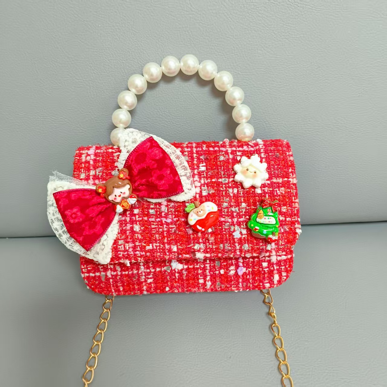 Cartera de Año Nuevo rojo arco de papá Noel bolso de perla pequeña cadena de viento fragante bolso de hombro