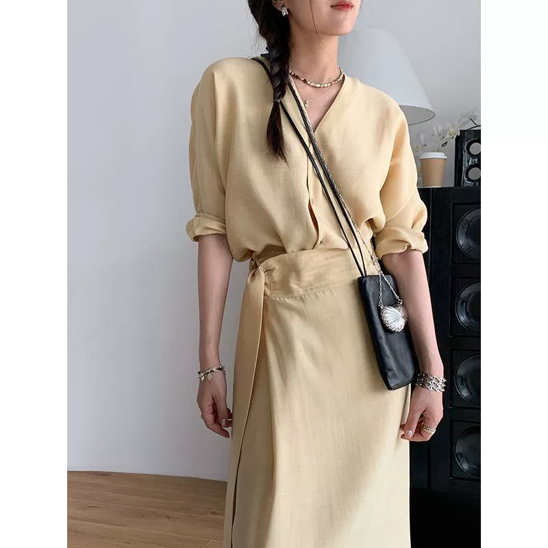 2025 весна-лето новая модная женская костюмная одежда: топ с V-образным вырезом, юбка с эффектом стройнящего силуэта, элегантная длинная юбка, комплект из двух предметов