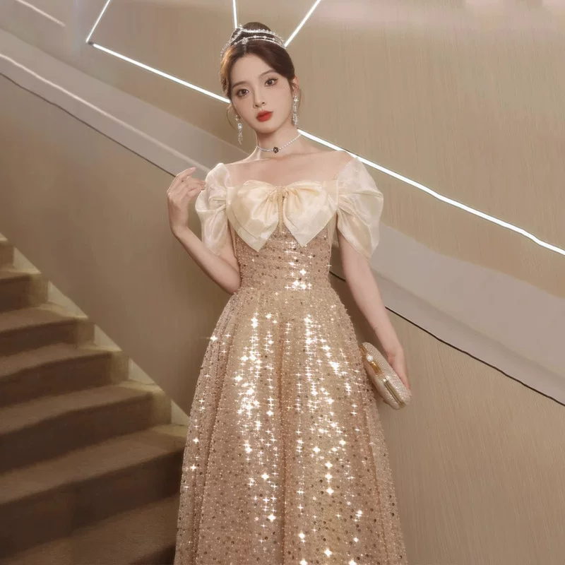 Golden evening dress, elite skirt, open shoulders, high-quality style