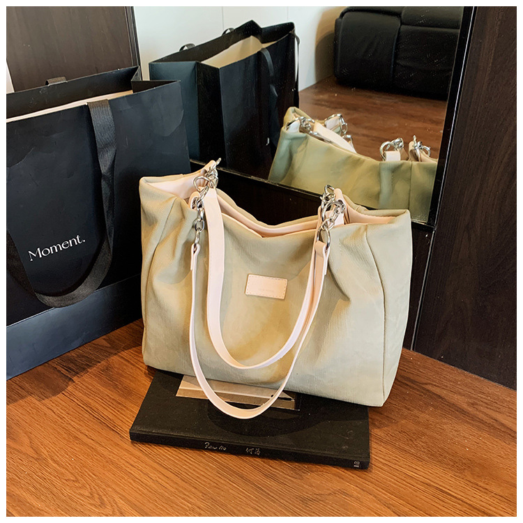 Korean style simple and versatile bag for women, new summer 2025 fashion and niche handbag, large capacity tote bag for commuting undefined