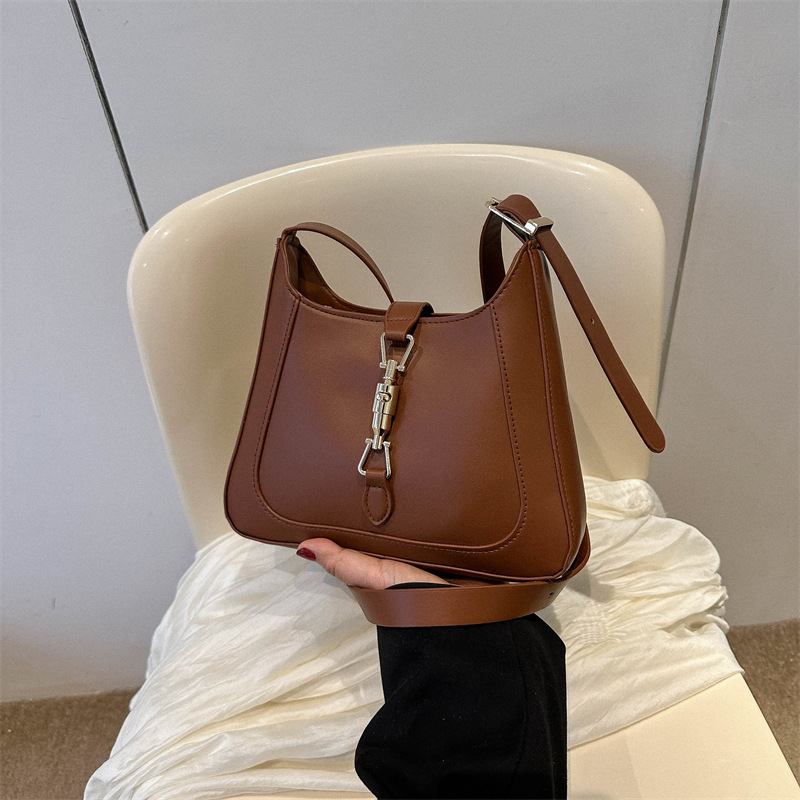 Bolsa de axilas bolsa de textura para mujer verano 2023 nuevo diseño de moda bolsa de mensajero bolsa de palo francés bolsa de hombro simple