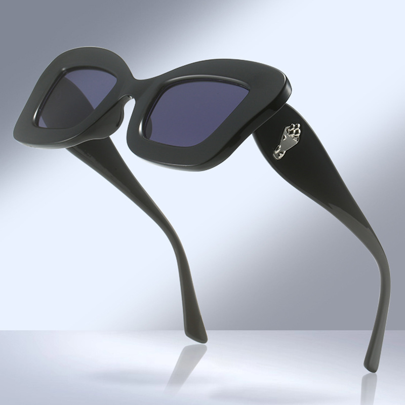 Fabricante nuevas gafas de sol transfronterizas europeas y americanas gafas de sol de ojo de gato de moda retro street shooting gafas de sol de alta gama al por mayor