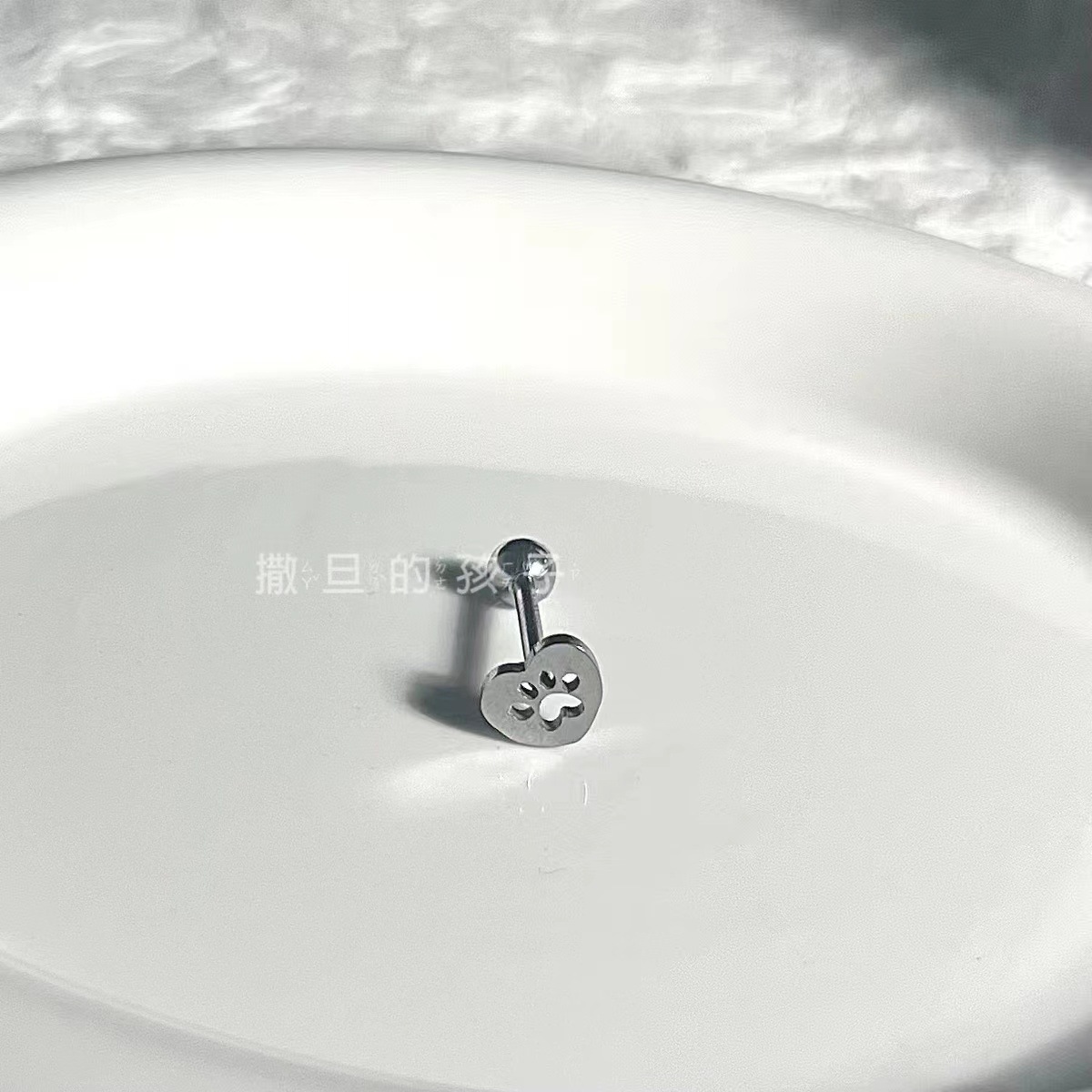 Silver pointed spike labret stud material detail