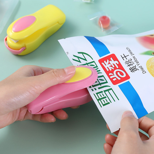 Household portable mini plastic bag sealing machine snacks small hand pressure heat sealing machine plastic sealing machine sealing clip wholesale