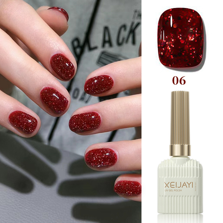 Año nuevo diamante rojo esmalte de uñas pegamento neto rojo esmalte de uñas pegamento de sangre blanco transparente rojo roto diamante flash fototerapia pegamento para salón de uñas