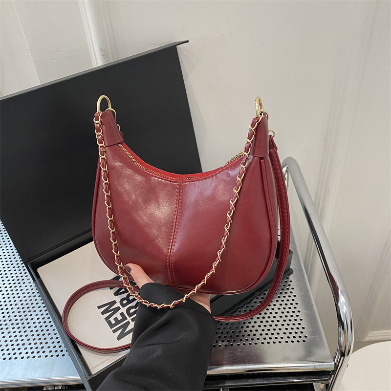 Bolsa de cadena de textura para mujeres de gran capacidad 2025, nuevo bolso de mujer simple PU, bolso de hombro de moda empalmado mochila