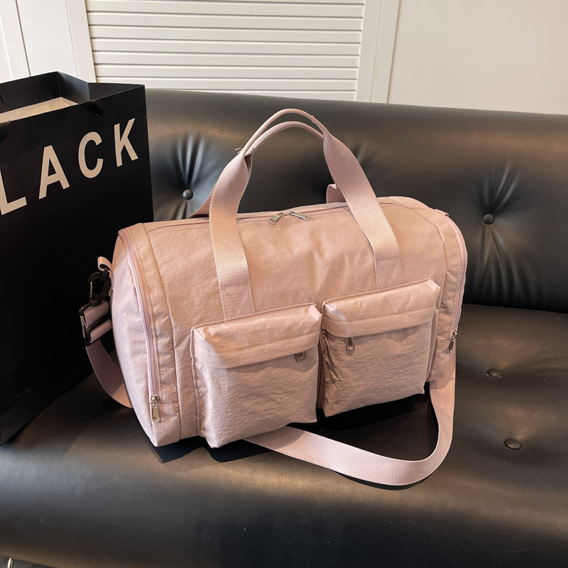 Bolsa de viaje de gran capacidad de textura retro bolso de almohada de moda 2025 nuevo bolso de hombro universal bolso de viaje