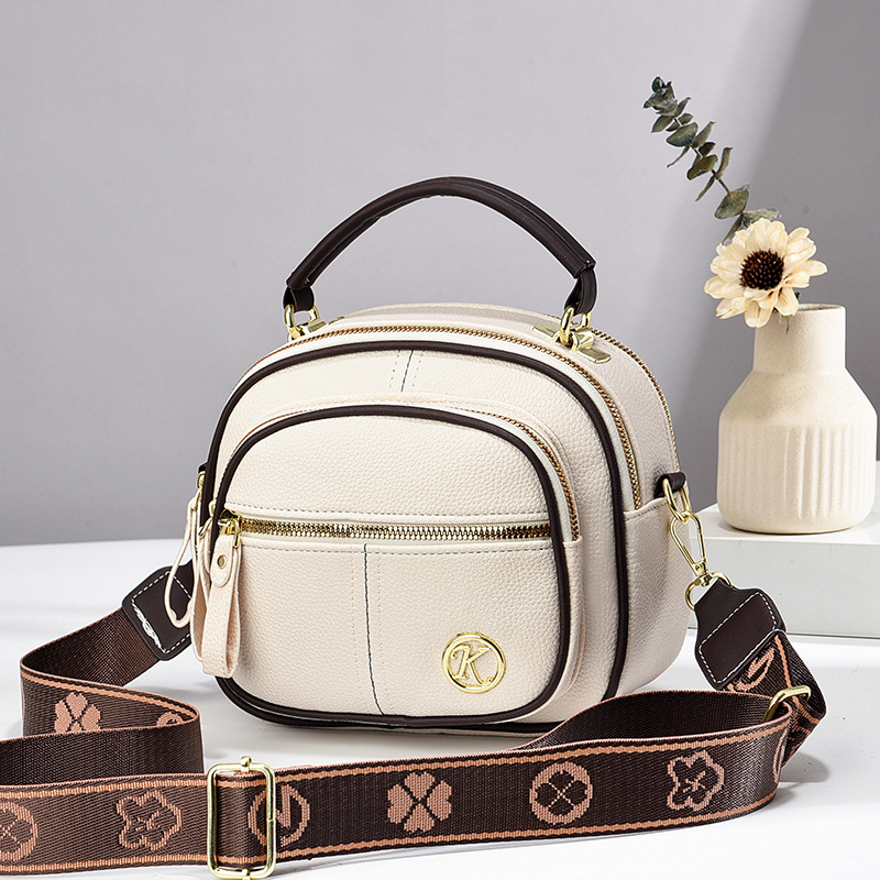 Exquisita mini bolso de verano 2025, nuevo bolso redondo, bolso de hombro casual versátil, bolsos de mano