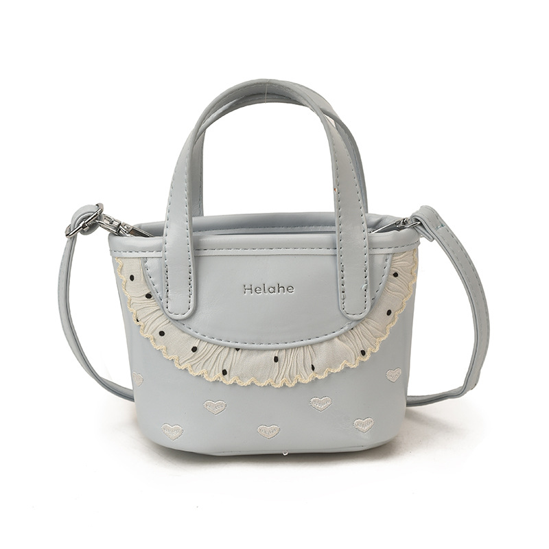 Amor extranjero en relieve, bolsas de cestas para niños y niñas, bolsas de mano de encaje dulce coreana, nuevas bolsas de niños transfronterizas