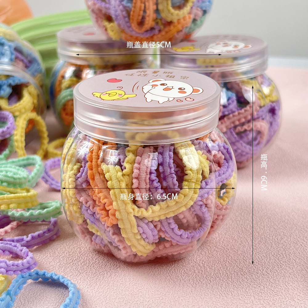 Banda de pelo para niños banda de goma al por mayor color caramelo lazo del pelo del bebé cuerda de pelo no duele la cuerda de pelo alta banda de goma elástica