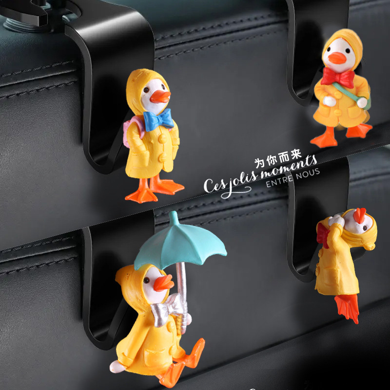 Asiento de coche ganchos traseros suministros interiores patito coche asiento respaldo coche lindo paraguas almacenamiento