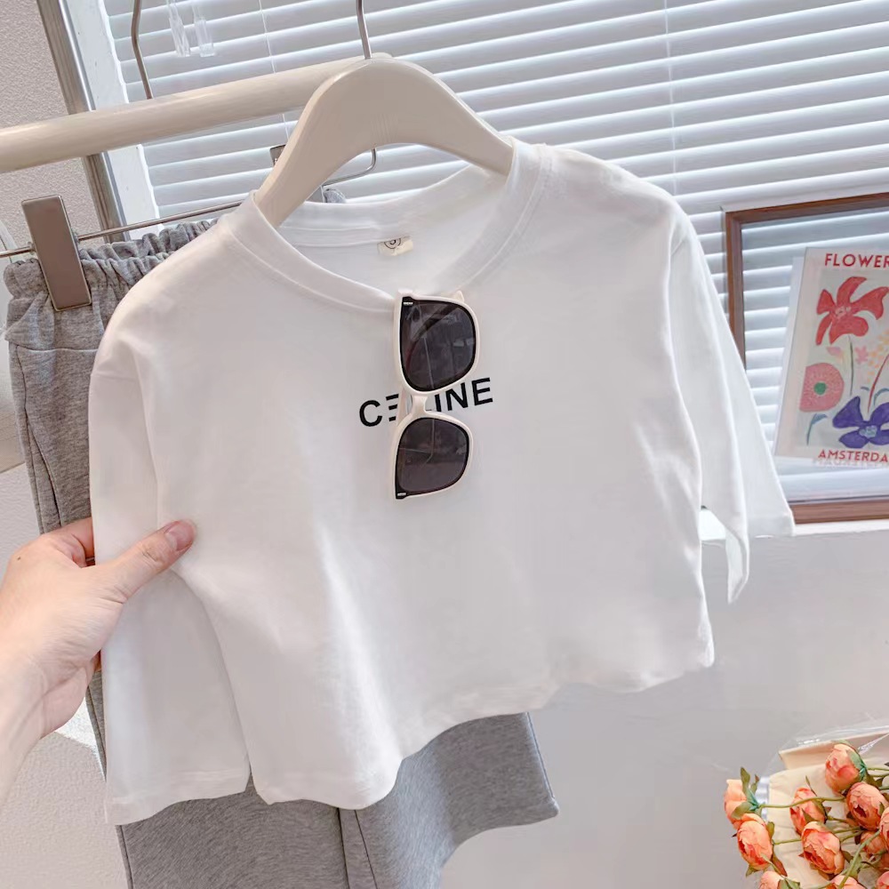 Camisa de fondo de algodón para niños 2023 nuevos niños y niñas letra impresa Camiseta de manga larga bebé simple cuello redondo interior t