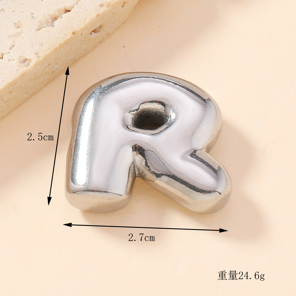 Colgante único venta cruzada de burbujas de fundición 26 collares de letras inglesas accesorios colgante DIY joyas de acero inoxidable