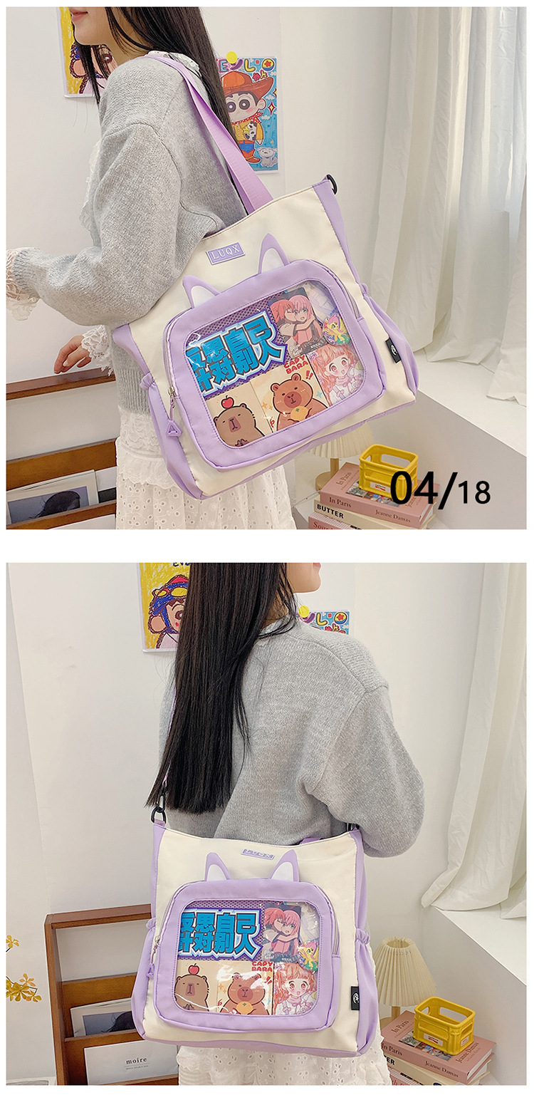 The new cute cartoon printed student bag with a large capacity and transparent student storage single-shoulder bag is selling well for women undefined