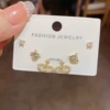 Golden set with zircon, earrings, 3 piece set