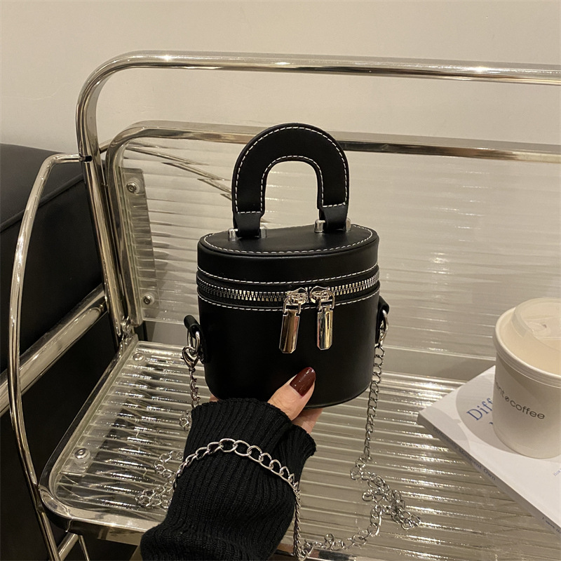 Otoño y invierno coreano bolso de cubo de color contraste para mujeres 2024 nuevo bolso de mano de moda de un hombro bolso de cilindro casual