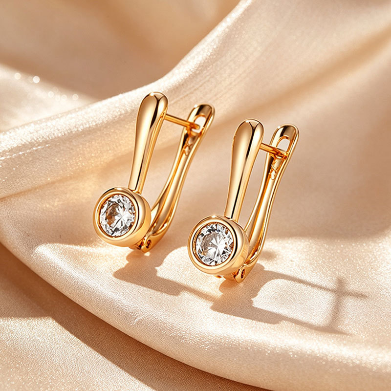 Pendientes de circonita artificial con baño de cobre Xuping en color oro de 18K para mujer, estilo europeo y americano, clips para las orejas, venta al por mayor transfronteriza de comercio exterior en stock.