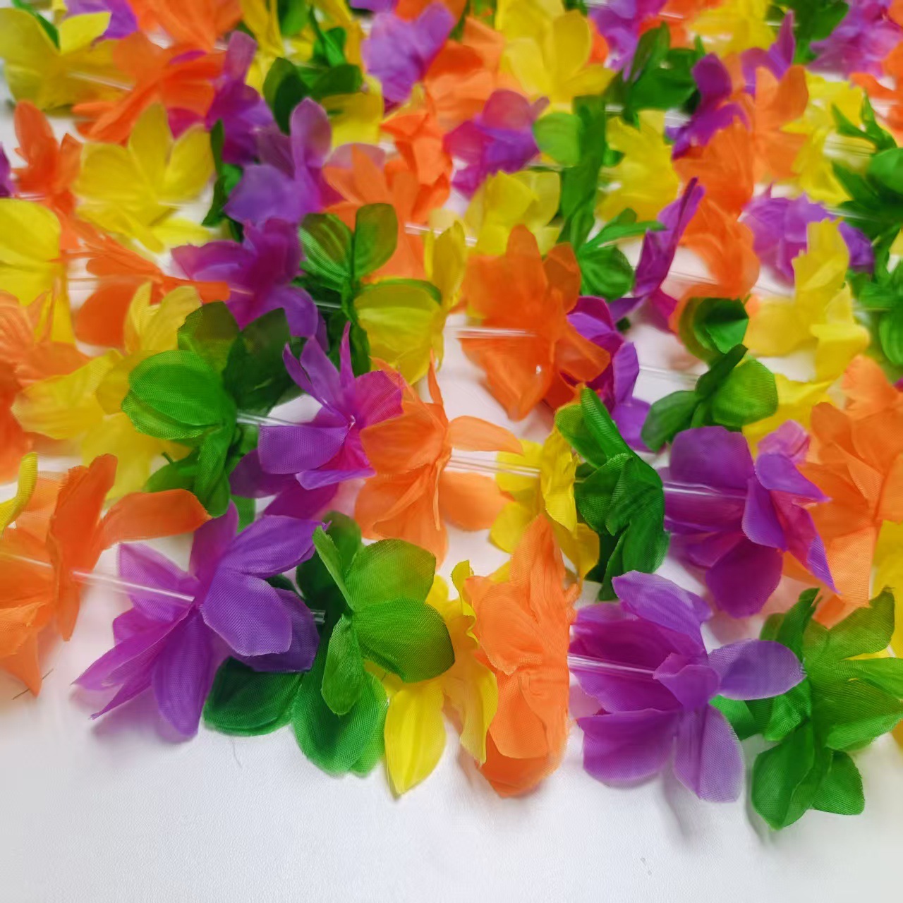 12 36 pares de cuatro colores colgar guirnaldas de color de pétalos de imitación hawaiana cuello de poliéster decoración de guirnaldas de tela