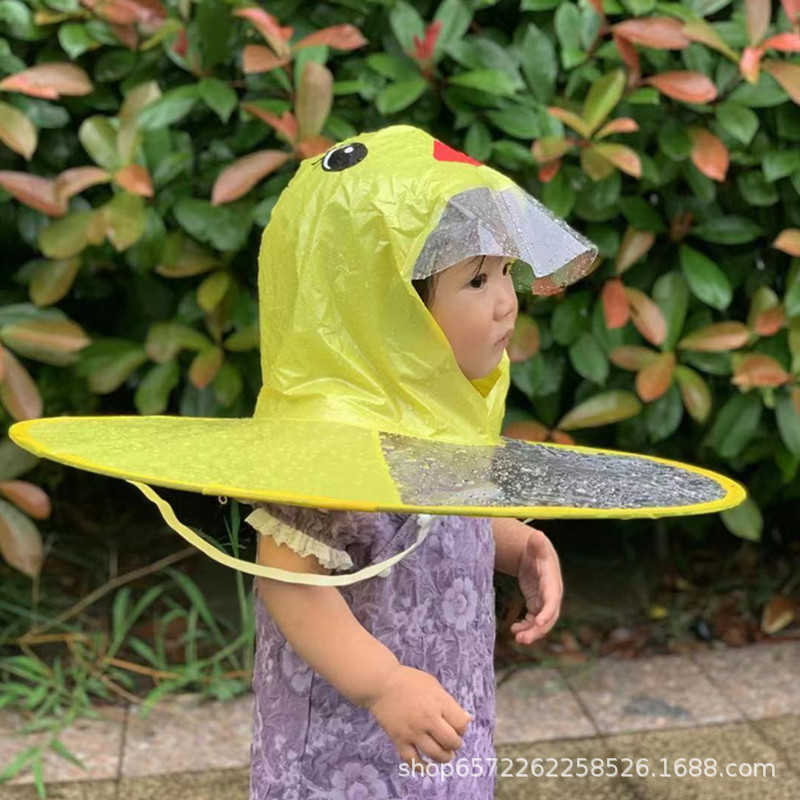 空飛ぶ円盤の雨の帽子の子供の折り畳みの軽やかな小さい黄色のアヒルの頭式のレインコートのかわいい男女の子供の漫画のマントのレインコート|undefined