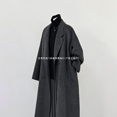 両面のカシミヤのコートの女性の冬の新型感の中で長いタイプの韓系のゆったりしている炭の灰色の毛のコートです。