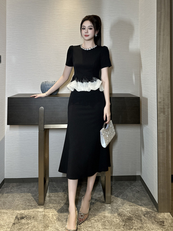 2025夏の新型婦人服のフランスの丸首は腰のハスの葉の辺を収めてやせています。|undefined